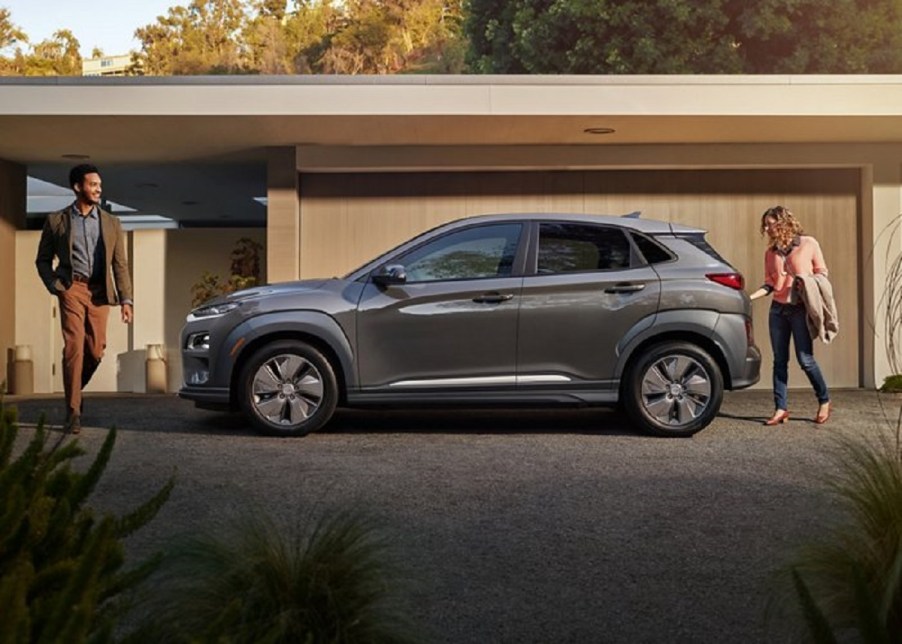 A 2021 Hyundai Kona Electric outside of a house.