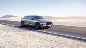 The 2022 Jaguar I-Pace Black parked on a highway road in the desert