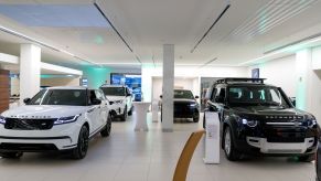 New cars inside a car dealership. Now is a tough time to buy a new car. Consumer Reports has some tips on not getting hosed on new car prices