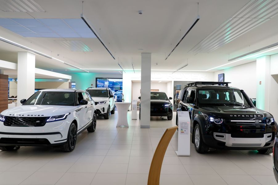 New cars inside a car dealership. Now is a tough time to buy a new car. Consumer Reports has some tips on not getting hosed on new car prices