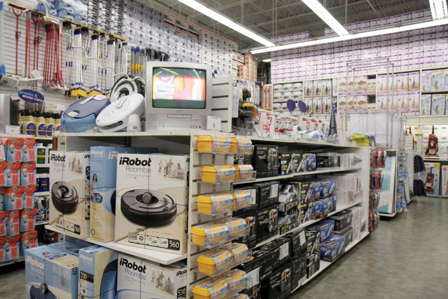 Robot vacuum cleaners on a merchandise display in a Bed Bath & Beyond