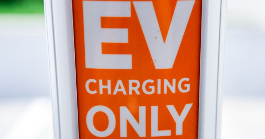 A sign that reads "EV Charging Only" at a ChargePoint vehicle (EV) charging station at the Homewood Suites by Hilton hotel in Spring Township, PA Wednesday morning July 21, 2021.