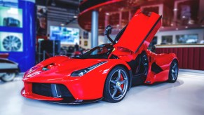 A Ferrari LaFerrari in Rosso Corsa red for sale at Joe Macari Performance Cars in Wandsworth, England