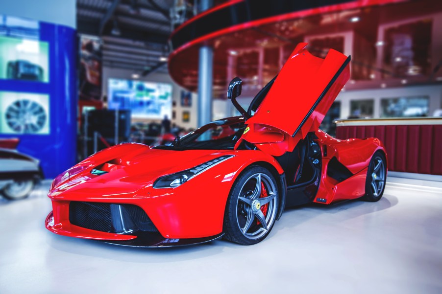 A Ferrari LaFerrari in Rosso Corsa red for sale at Joe Macari Performance Cars in Wandsworth, England