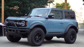 A blue new Ford Bronco is displayed at the Chicago Auto Show on July 14, 2021 in Chicago, Illinois.