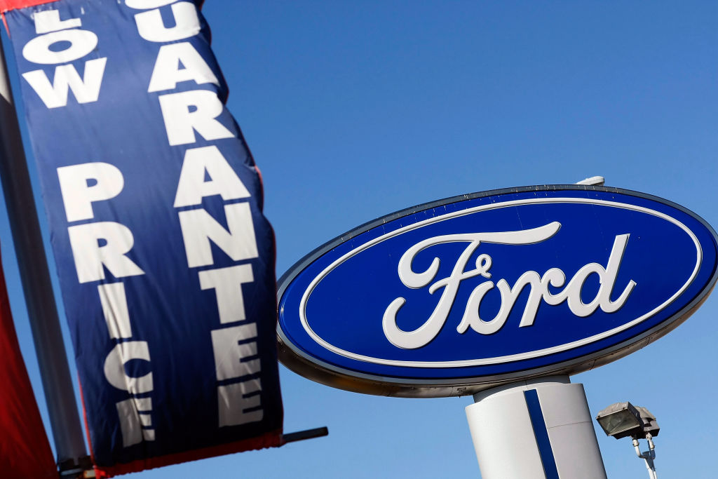 Ford dealership sign for buying a new car