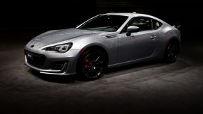 A silver Subaru BRZ at an auto show