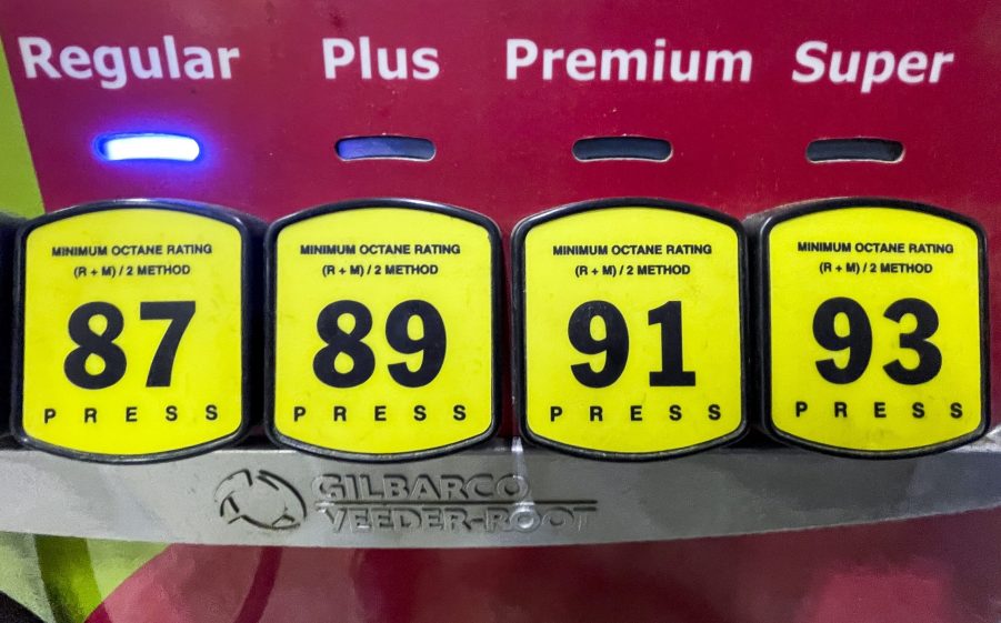 Gas prices are displayed at a pump