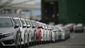 A row of Honda Civic sedans in Japan