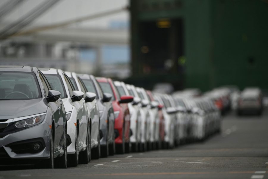 A row of Honda Civic sedans in Japan