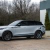 A Land Rover Range Rover Velar PHEV model connected to a charging station