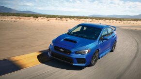 Subaru WRX STI in blue on a racetrack