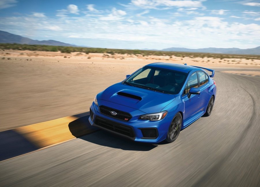 Subaru WRX STI in blue on a racetrack