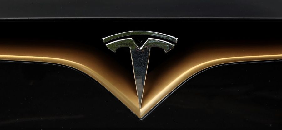 The Tesla logo on the front of a Model S vehicle