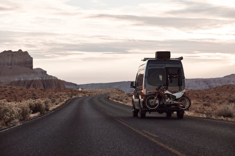 Thor 4x4 Sanctuary camper van with a dirtbike on the back