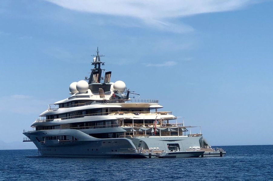 A large Yacht in the middle of the ocean.