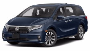 A navy 2021 Honda Odyssey against a white background.