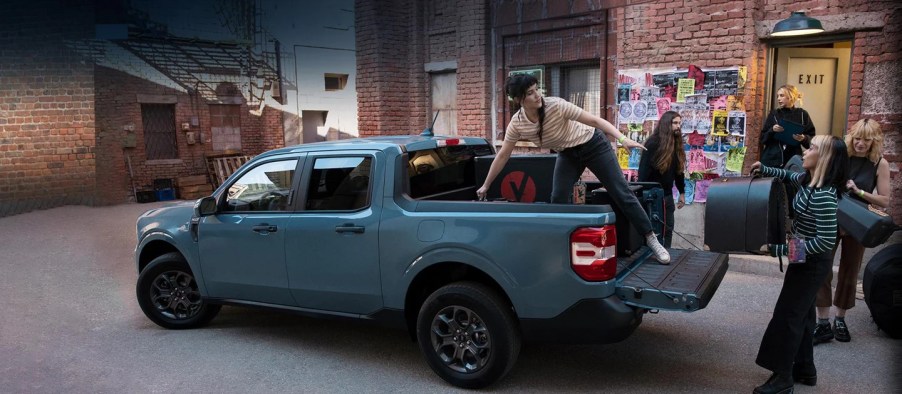 2022 Ford Maverick parked in the city with someone in the back