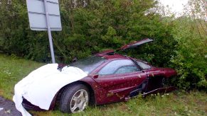 a wrecked mclaren f1 supercar