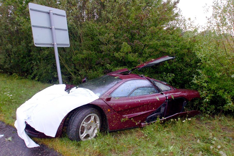 a wrecked mclaren f1 supercar