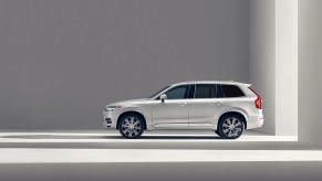 A white 2021 Volvo XC90 in a white room.