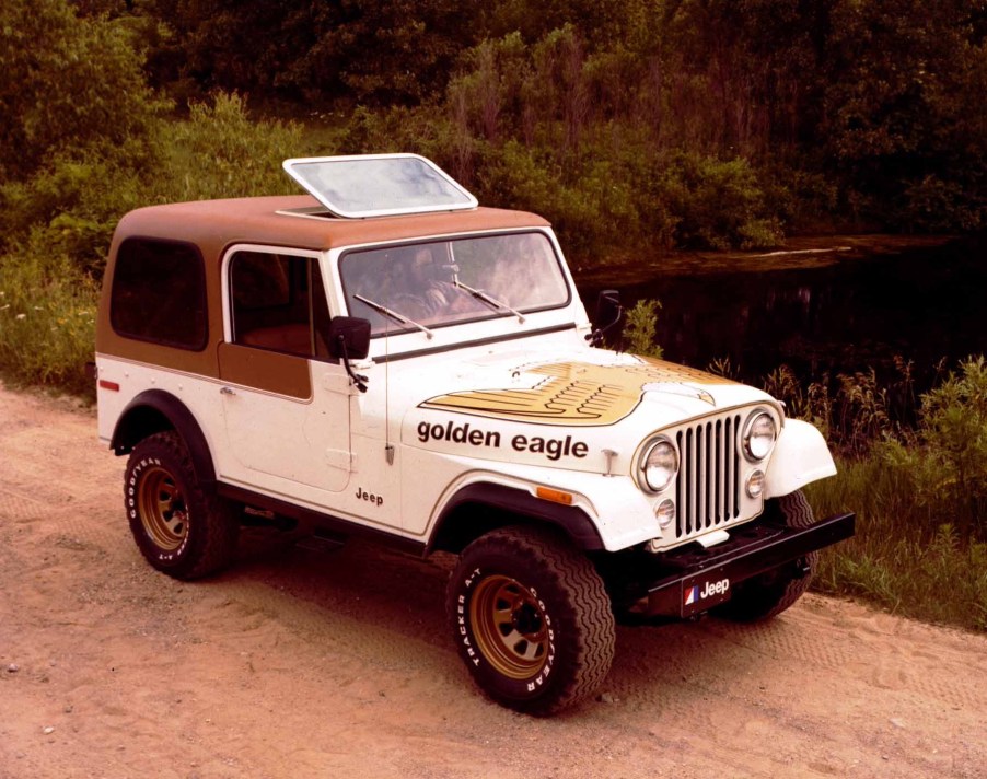 A 1979 Jeep CJ-7 Golden Eagle parked on a dirk road