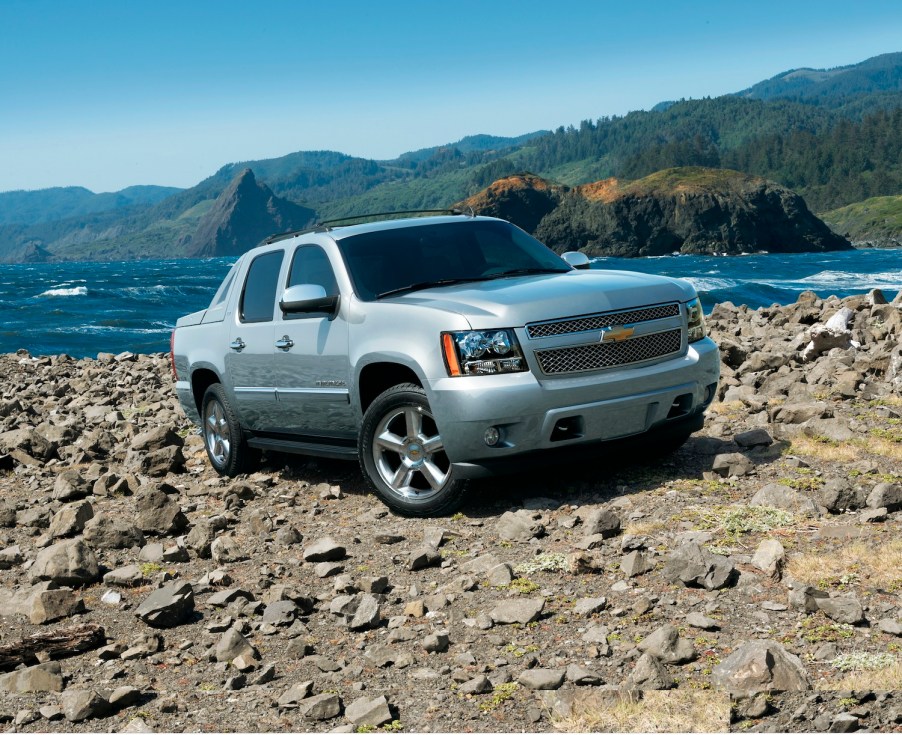 The 2012 Chevrolet Avalanche off-roading over rocks