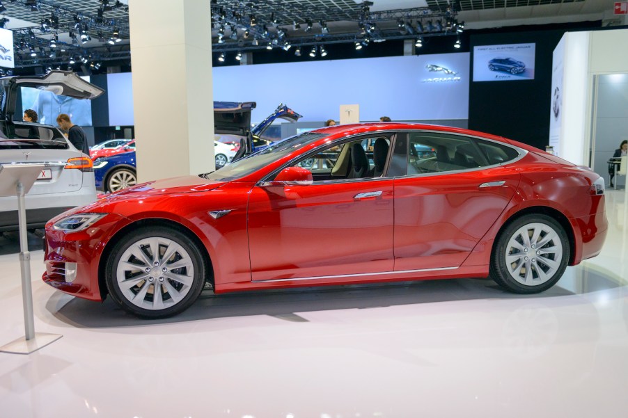 A red 2017 Tesla Model S at a car show, the Model S is one of the best used EVs