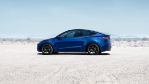 A blue 2021 Tesla Model Y parked in the desert, the 2021 Tesla Model Y is the best AWD electric vehicle