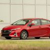 The 2021 Toyota Prius Prime hybrid model in red