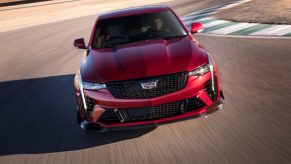 A red 2022 Cadillac CT4-V Blackwing on track