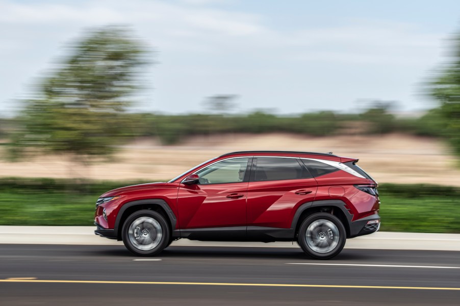 A red 2022 Hyundai Tucson driving