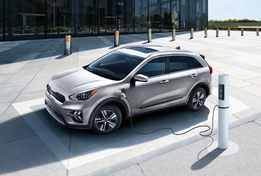 A grey 2022 Kia Niro Plug-In Hybrid being charged.