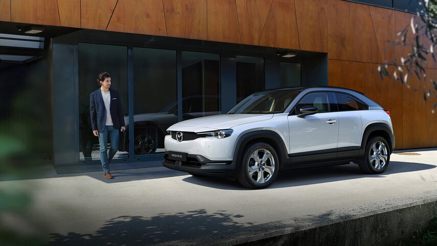 The 2022 Mazda MX-30 EV parked in the city