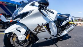 A white 2022 Suzuki Hayabusa in a parking lot