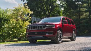 The 2022 Jeep Grand Wagoneer driving down the road.