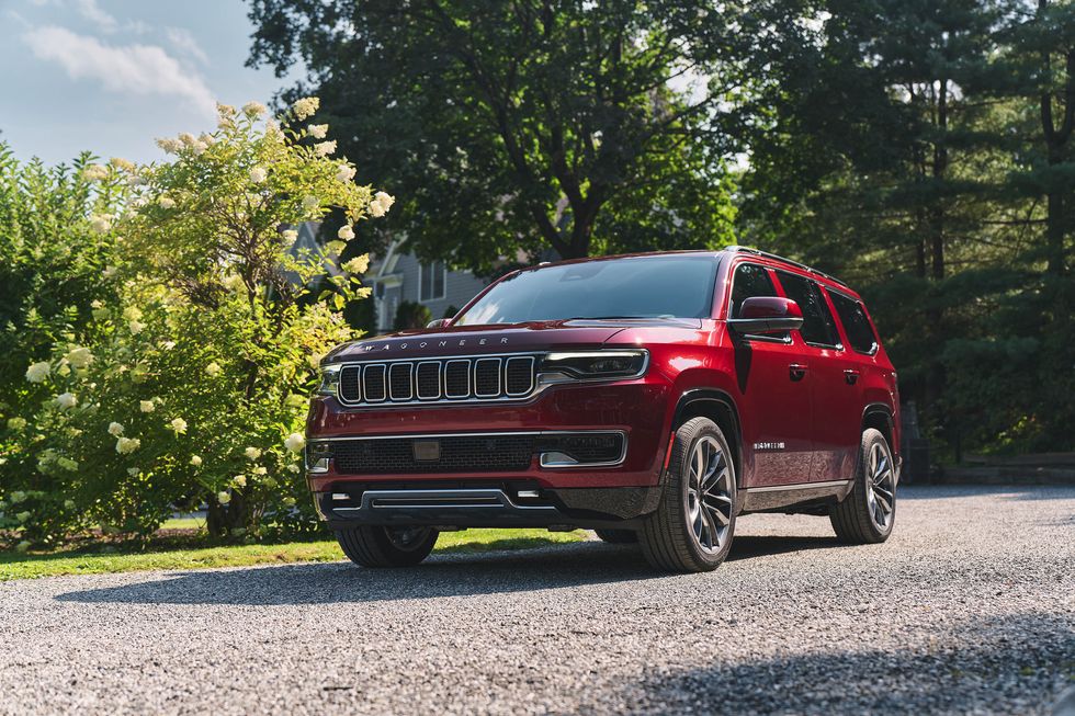 The 2022 Jeep Grand Wagoneer driving down the road.