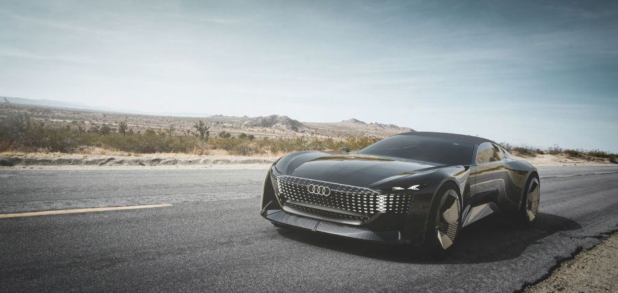 The Audi Skysphere concept car model parked on the side of a country highway