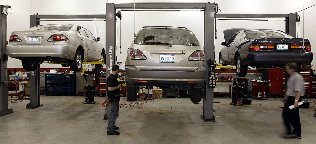 cars in dealership service bays