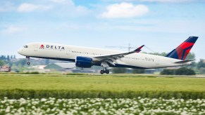 Delta Air Lines Airbus A350-900 aircraft as seen on final approach landing at Amsterdam Schiphol AMS EHAM airport in the Netherlands. The Delta Airlines modern and advanced wide-body airplane has the registration N512DN and is powered by 2x RR jet engines. Delta DL DAL is ranked the second-largest airline in the world with headquarters in Atlanta, Georgia US and is a member of SkyTeam airline aviation alliance.