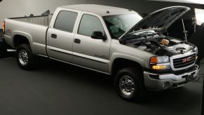 A 2005 GMC diesel pickup truck model with its hood raised