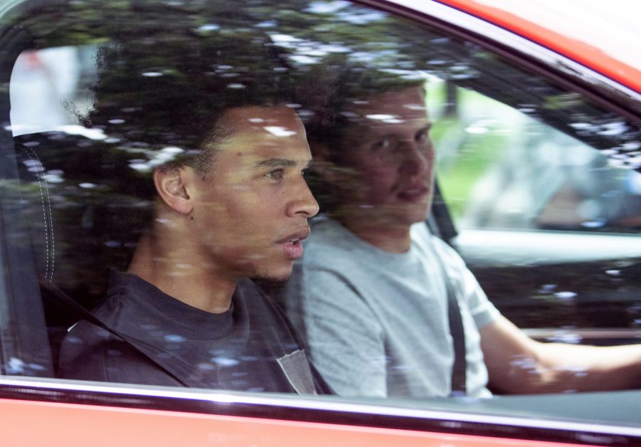 Man Riding Shotgun In The Passenger's Seat Of Car