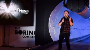 Elon Musk giving a speech at the Boring Company Hawthorne test tunnel in Hawthorne, California