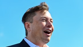 Tesla CEO Elon Musk stands on the construction site of the Tesla Gigafactory in Grünheide, Germany, in September 2020