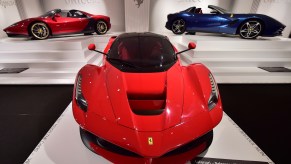 A red Ferrari LaFerrari hypercar, similar to the one collector David Lee purchased, is on display inside the Ferrari Museum in Maranello, Italy, in October 2015