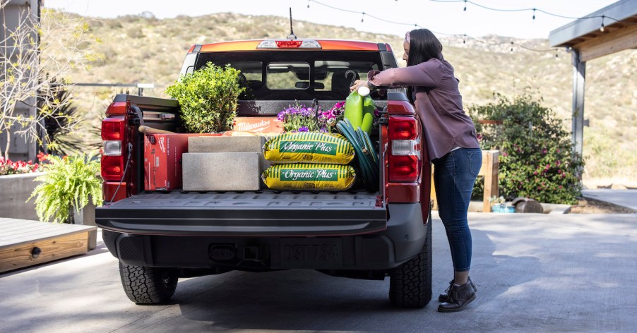 This is a promo photo of a 2022 Ford Maverick which has one of the smallest truck bed.