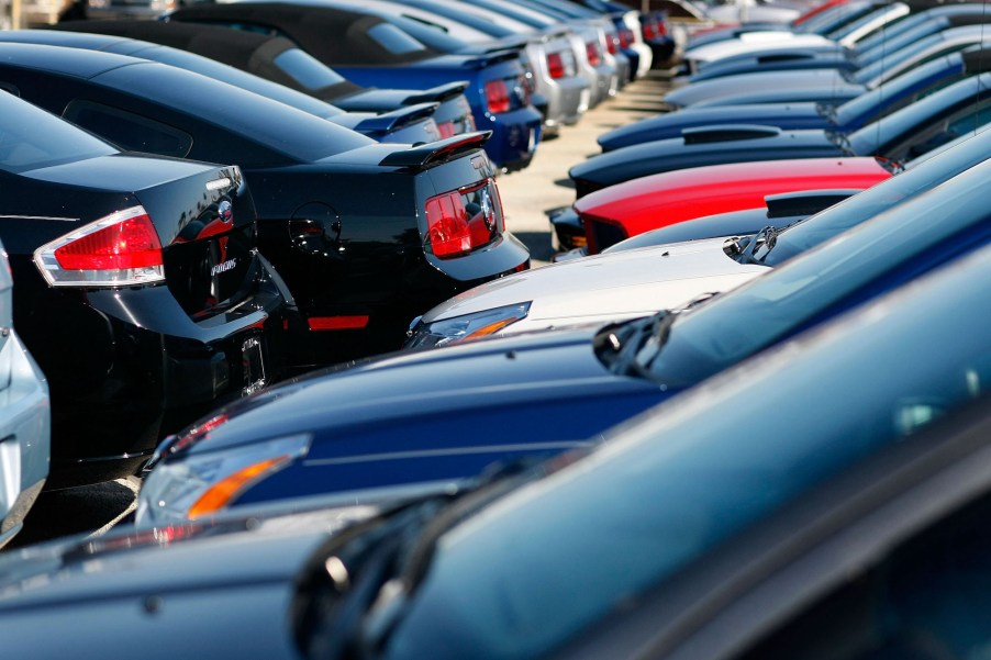 Ford cars are seen on the sales lot at the Metro Ford dealership in December 2008 in Miami, Florida