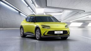 A yellow-green Genesis GV60