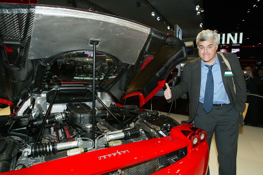 Jay Leno gives a red Ferrari Enzo a thumbs-up at the Detroit auto show, so why doesn't Jay Leno own a single Ferrari?