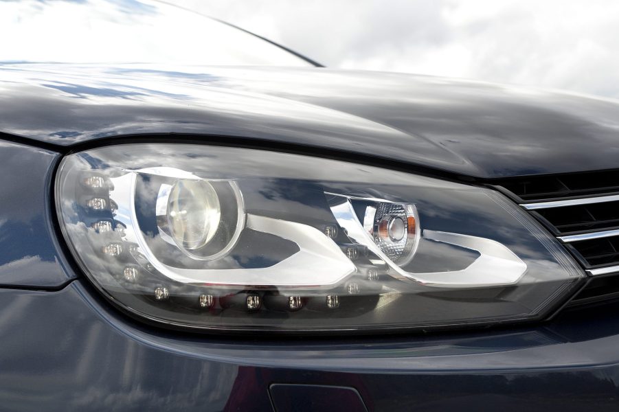 Nowhere is the cost of headlight repairs clearer than here. This blue Volkswagen Eos headlight is a $500 item